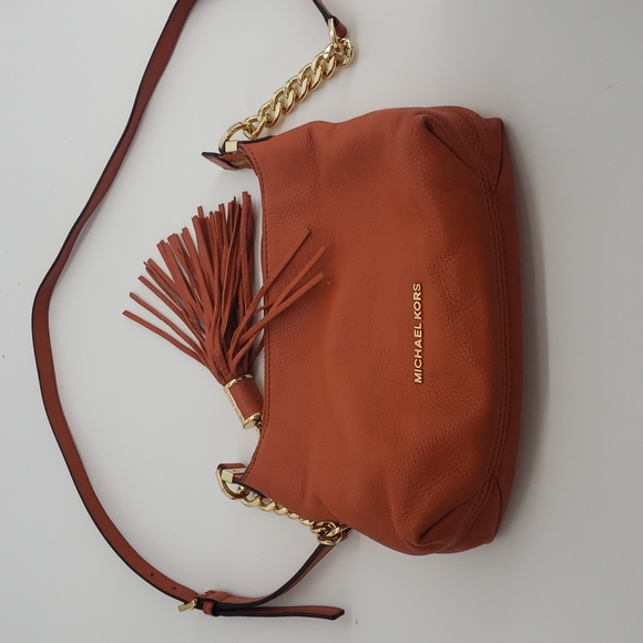 Michael Kors Orange Leather Crossbody bag with strap & tassle. - Picture 1 of 13